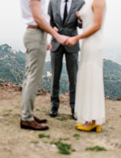 jacob performing an elopement with a couple overlooking Los Angeles