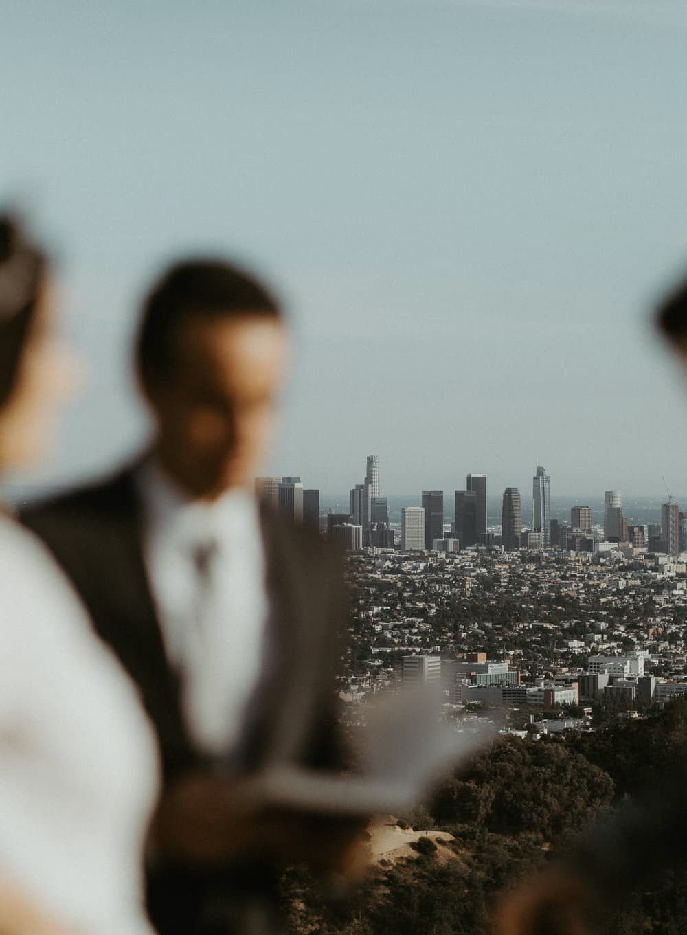 jacob performing an elopement with a couple overlooking Los Angeles