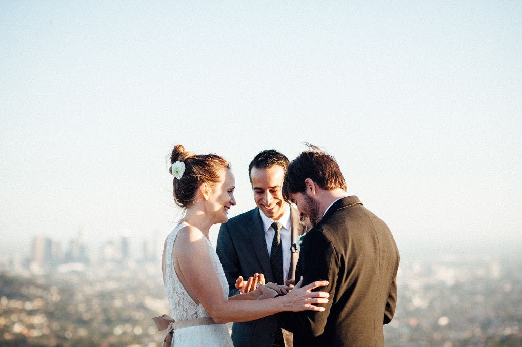 jacob performing an elopement with a couple overlooking Los Angeles